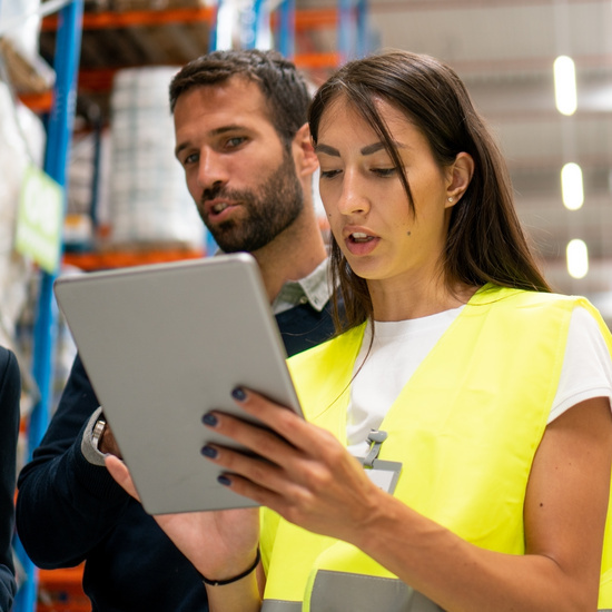 Worker revising inventory in a warehouse